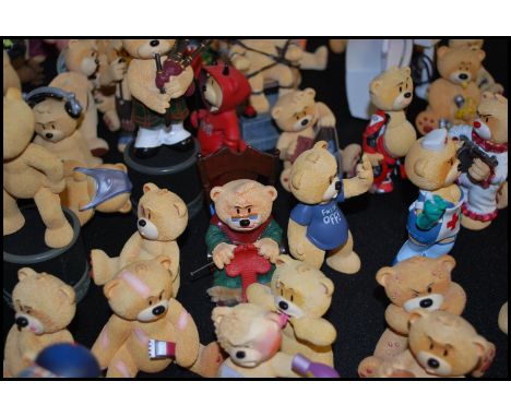 A large collection of novelty Bad Taste Bear figurines to include an Elvis bear, grumpy fairy bear, a light up electric chair