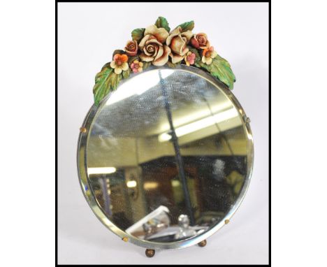 An early 20th century antique Art Deco Barbola mirror having an easel back with bevelled glass panel and hand painted floral 