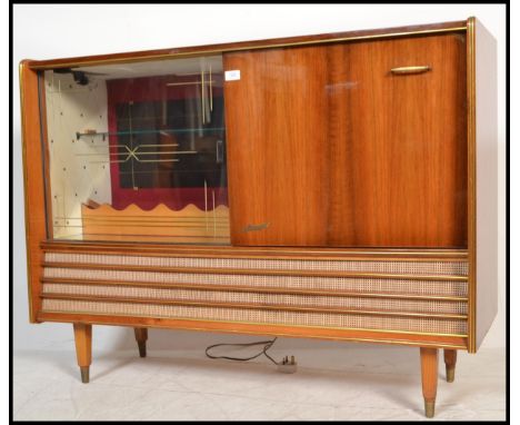 A vintage 20th Century walnut cased Mozart radiogram / bar in fantastic condition, fitted valve radio and four speed record d