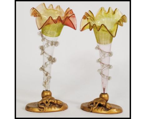 A pair of 19th century Victorian glass epergne centre pieces of trumpet form with orange and yellow coloured glass fanned rim