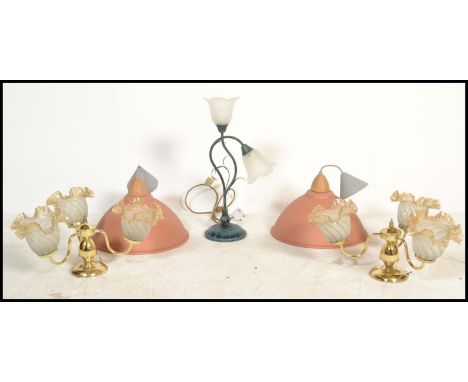 A selection of vintage 20th century retro lighting to include two 1960's matte finish pendant pink light shades, two brass an