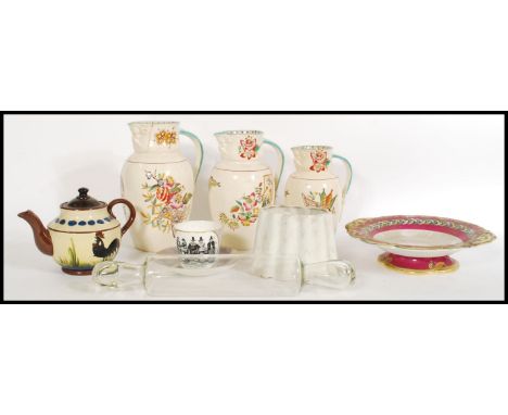 A set of 3 Victorian graduating jugs together with a 19th century tazza in the manner of Worcester, a glass Victorian rolling