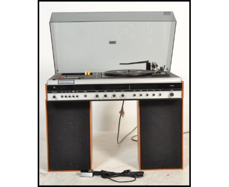A 20th century Ferguson retro Studio 6 record player /&nbsp; hi-fi system in a teak finish with acryllic hood being complete 