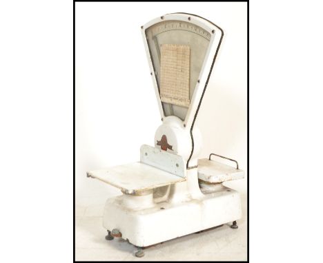 A large set of mid century Industrial shop enamel white grocers scales with central fan dial and colourful ' Graham ' makers 