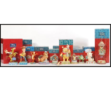 A selection of Disney Showcase figurines to include a 'Shining Sprite' Tinkerbell suspended in lantern figurine no. 4016590, 
