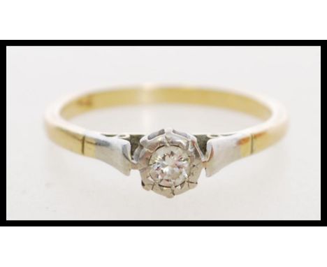 An 18ct gold diamond solitaire ring. Diamond approx 15pts.&nbsp; Marked 750 tests 18ct gold. Weight 2.6g. Size O.5.