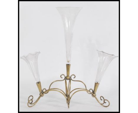 A 19th century Victorian glass and silver plated glass epergne centre piece, having one large central trumpet with two smalle