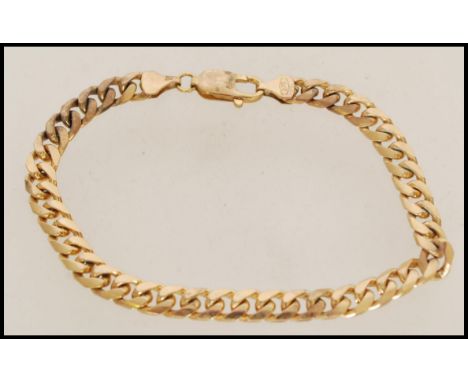 A 20th century stamped 9ct gold bracelet having flat links and a lobster clasp, item weighs 20.3g. Measures 22 cm long.