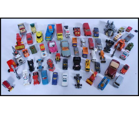 A collection of assorted vintage scale model diecast vehicles to include; a selection of Matchbox, Corgi and Solido diecast c