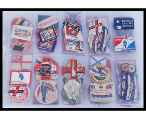 A collection of early 20th Century circa WWII lapel / pin badges to include Church Army War Fund, RNLI, Red Cross, British Sa