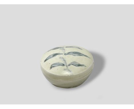 Bernard LeachLidded pot, circa 1960Porcelain, leaf design in blue glaze.9cm diameterImpressed with artist's BL and St Ives st