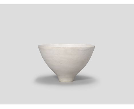 Lucie RieFooted bowl, circa 1970Porcelain, white glaze.15cm high, 22.8cm diameterUnderside with impressed LR seal.This lot is