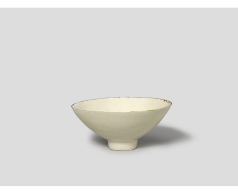 Lucie RieSmall footed bowl, circa 1970Porcelain, cream glaze, manganese rim.5.5cm high, 12.7cm diameterImpressed with artist'