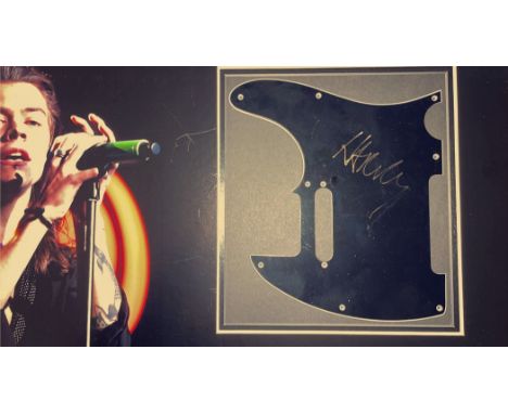 Harry Styles 23x13 overall mounted signature display includes a signed mounted guitar plate and superb colour image of the On