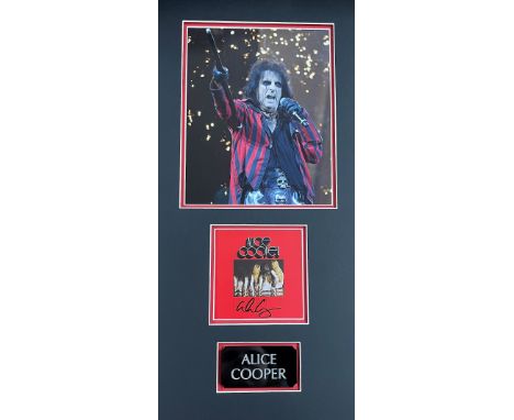Alice Cooper 22x11 overall mounted signature display includes signed Easy Action CD sleeve and superb colour photo of the leg