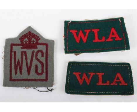 WW2 WVS and WLA Badges: Two Womens Land Army slip-on shoulder titles and WVS badge. 3 items 