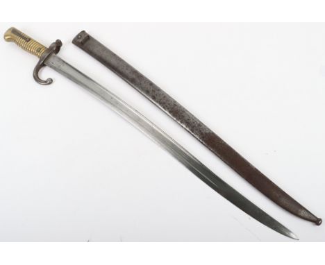 French Chassepot Bayonet, with one piece ribbed brass handle. Cross guard and top of scabbard stamped “RT 22521”. Armourers d