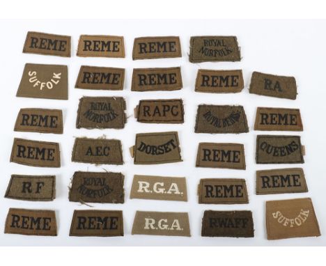 British Army Slip-ons Shoulder Titles: Early and WW2 slip-ons ,15 WW2 printed REME , two early SUFFOLKS, rest being WW2 perio