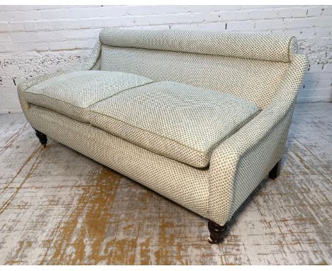 VICTORIAN SOFA, upholstered in Fermoie 'Marden' fabric, with turned mahogany front supports and castors, 74cm H x 151cm W x 7