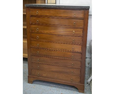 GAMES TABLE CHEST, 19th century French mahogany containing top drawer above eight removable card tables with green suede tops