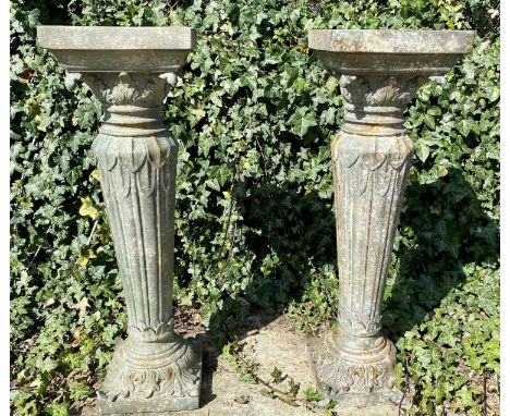 GARDEN PLANT STANDS, a pair, aged faux ceramic, foliate detail, 95cm H. (2) 