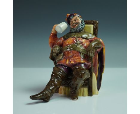 This colorful porcelain figure depicts a cheerful cavalier lounging in a chair, dressed in a red and orange tunic, olive gree