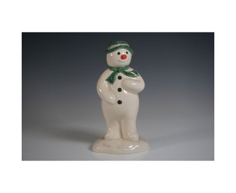 Add a whimsical touch to your collection with this Royal Doulton ceramic coin bank, part of the Snowman Gift Collection. This