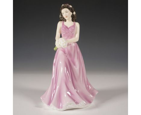 This exquisite Royal Doulton figurine, April Daisy Innocence (HN5503), is part of the Flower of the Month collection. Crafted