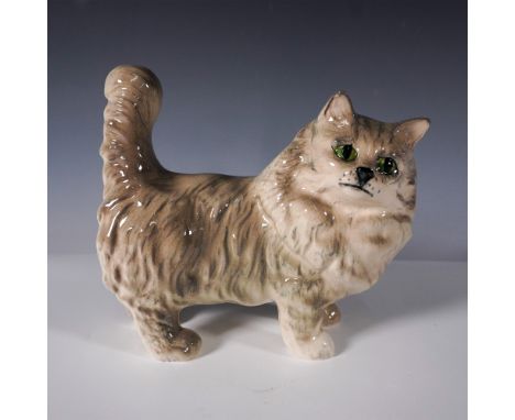This is a Royal Doulton porcelain figurine depicting a Persian cat. Crafted with fine detail and hand-painted to showcase the