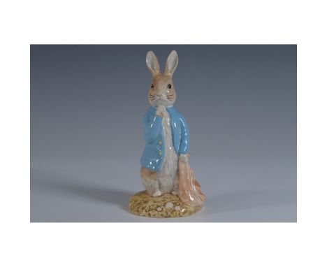 This delightful Royal Albert figurine features Peter with Red Pocket Handkerchief, a beloved character from Beatrix Potter's 