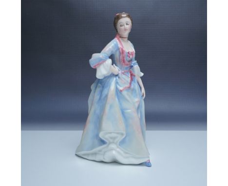 A beautifully limited edition hand painted porcelain figurine from the esteemed Reynolds Ladies series, captures the grace an