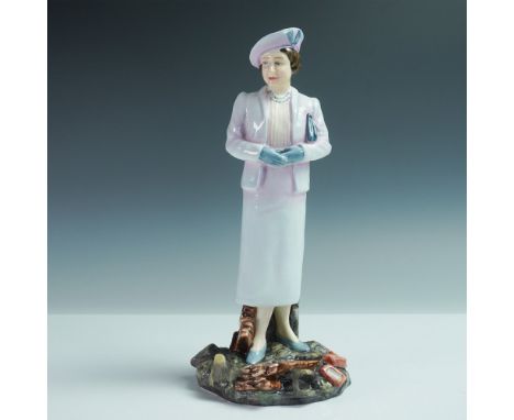 Fine bone china figure portrays Queen Elizabeth The Queen Mother in a pastel lavender ensemble, including a tailored jacket, 