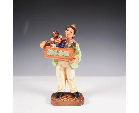 Royal Doulton figurine Organ Grinder HN2173, a delightful representation of a street musician and his companion. This fine bo