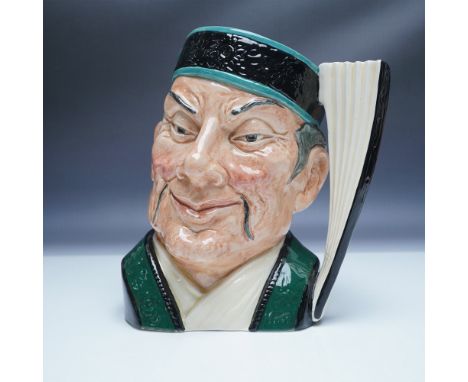 Part of the Asian Heritage series, this Royal Doulton large character jug features The Mikado, a figure inspired by the class