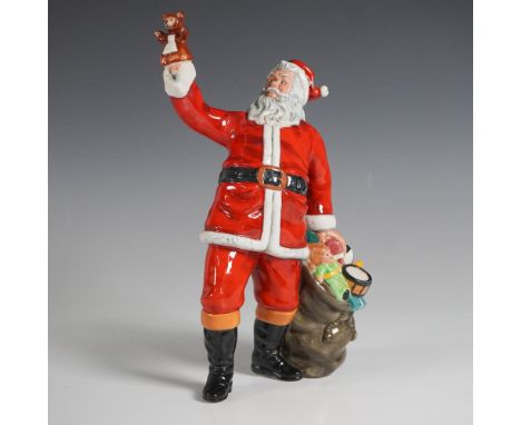 Royal Doulton figurine titled Santa Claus HN2725, designed by William K. Harper and issued in 1991. Standing at 10.25"H, this