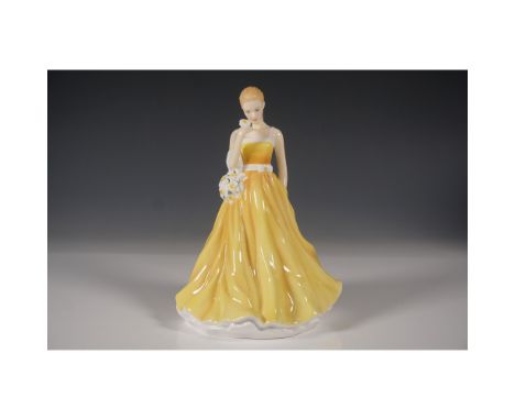 A beautiful Royal Doulton Flower of the Month figurine, March Jonquil Devotion, model HN5502. This hand-made and hand-decorat