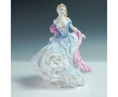 Part of the Royal Doulton International Collectors Club, this fine bone china figurine features a woman in a gown. She is pos