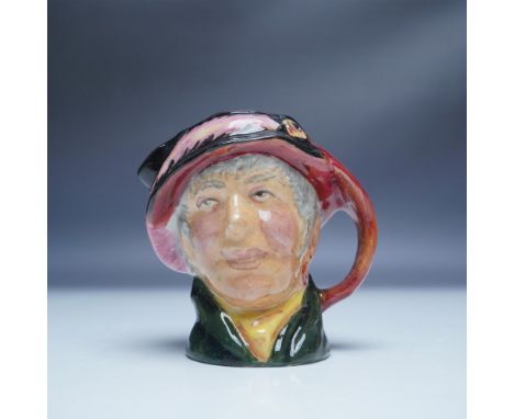 Featuring a distinctive colorway variation. This hand painted ceramic jug depicts the cheerful character 'Arriet with a pink 