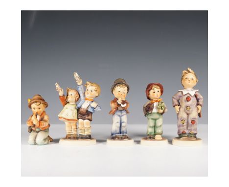 A charming collection of six Goebel Hummel figurines, each depicting expressive children engaged in playful and whimsical act