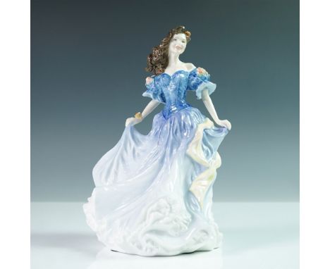 This Royal Doulton porcelain figurine, was the Figure of the Year for 1998. Designed by Valerie Annand, the elegant piece por