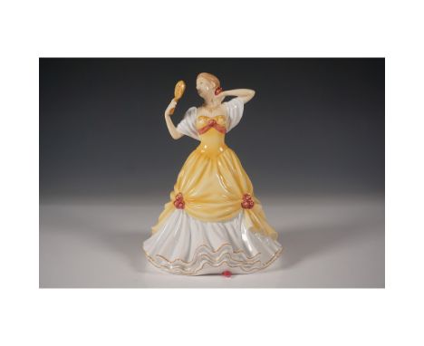 A beautiful Royal Doulton Pretty Ladies "Lauren" figurine, model HN5514, crafted from fine bone china. Designed in England, t