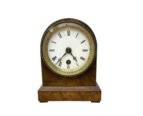 French - late 19th century 8-day walnut table clock, with a round top and shallow plinth raised on block feet, enamel dial wi