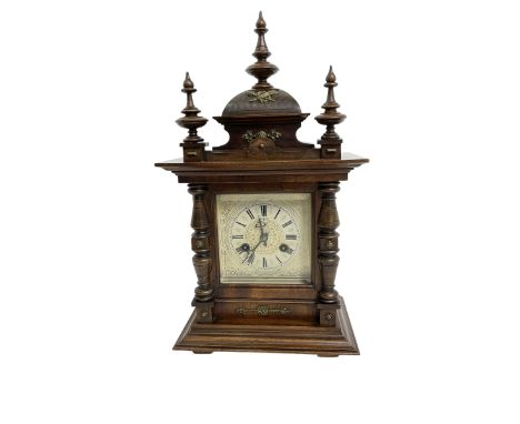 Juhngans -  8-day oak cased mantle clock c1910, with a carved ogee pediment and turned finials, turned half-columns to the di