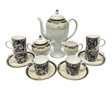 Wedgwood Cornucopia coffee service for six, comprising coffee pot, milk jug, twin handled covered sucrier, coffee cans and sa