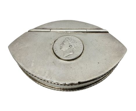 Plated snuff box set with a George IV coin dated 1828, with hinged cover and bead effect border 