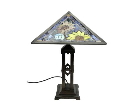 Tiffany style table lamp, the shade with four mosaic glass panels depicting sunflowers on a blue marble effect ground, raised