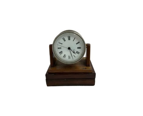 English - Edwardian 8-day desk clock, drum movement and dial pivoted on a wooden base attached to a mahogany stationery box w