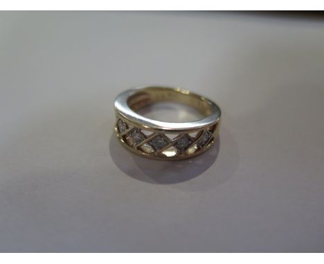 A hallmarked 9ct six stone diamond open band ring, 0.26ct, ring size M/N, approx 4.4 grams, in good condition (7171B) 