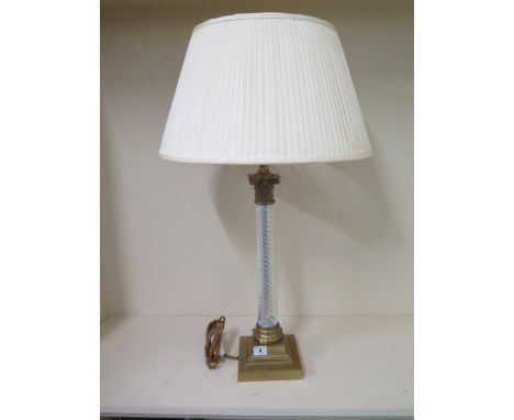 A brass table lamp with a twisted glass stem with shade, 74cm tall 
