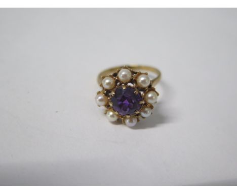 A hallmarked 9ct yellow gold amethyst and pearl ring, 15mm head, size P, approx 4 grams, in generally good condition 